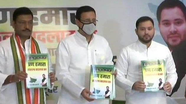 The grand alliance partners in Bihar released the election manifesto on Saturday.(ANI Photo)