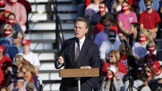 Republican Senator David Perdue speaks during a campaign rally for US President Donald Trump at Middle Georgia Regional Airport on October 16 in Macon, Georgia. (AP) Republican Senator David Perdue speaks during a campaign rally for US President Donald Trump at Middle Georgia Regional Airport on October 16 in Macon, Georgia. (AP)