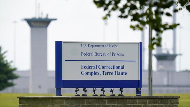 File photo shows the federal prison complex in Terre Haute, Ind. A woman convicted of fatally strangling a pregnant woman, cutting her body open and kidnapping her baby is scheduled to be the first female inmate put to death by the U.S. government in more than six decades, the Justice Department said Friday.(AP Photo)