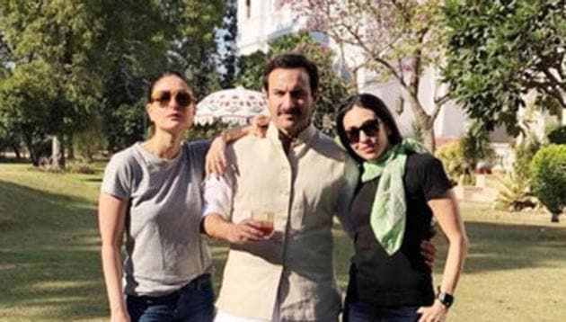 Saif Ali Khan poses with Kareena Kapoor and Karisma Kapoor at the Pataudi Palace.