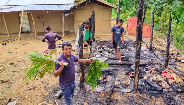 Assam officials inspecting the temporary huts which were torched on the Assam-Mizoram border on Saturday night (HT PHOTO) Assam officials inspecting the temporary huts which were torched on the Assam-Mizoram border on Saturday night (HT PHOTO)