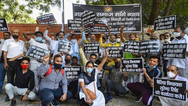 Activists demand justice for Jai Prakash who was allegedly shot dead while attending a meeting over the allotment of ration shops at Durjanpur village in Ballia (UP), at Jantar Mantar in New Delhi on October 18.(PTI)