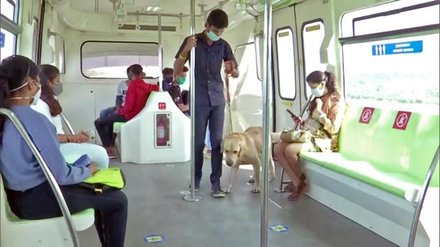 Commuters travel in the Mumbai Monorail as its services resume after months, in Mumbai on Sunday.(ANI)