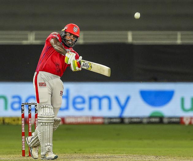 Dubai: Kings XI Punjab player Chris Gayle plays a shot during their Indian Premier League (IPL) T20 cricket match against Mumbai Indians (MI), at Dubai International Cricket Stadium in Dubai, Sunday, Oct. 18, 2020. (PTI Photo/Sportzpics for BCCI)(PTI18-10-2020_000206B) (PTI)