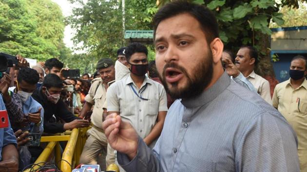 RJD leader Tejashwi Yadav interacts with media outside his residence, in Patna, Bihar.(Santosh Kumar/ Hindustan Times)