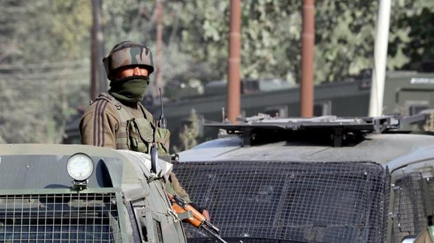 Personnel stand guard in Pulwama. (ANI Photo) (ANI) Personnel stand guard in Pulwama. (ANI Photo) (ANI)