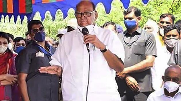 NCP chief Sharad Pawar interacts with farmers during a visit to a village to inspect damaged crops, at Tuljapur in Osmanabad district of Maharashtra on Sunday. (PTI) NCP chief Sharad Pawar interacts with farmers during a visit to a village to inspect damaged crops, at Tuljapur in Osmanabad district of Maharashtra on Sunday. (PTI)