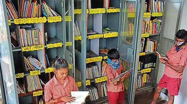 The students and teachers placed small wooden partitions within the cupboards and displayed all the books, making them easily accessible. The books are catalogued as per authors and genres. (PRAFUL GANGURDE/HT) The students and teachers placed small wooden partitions within the cupboards and displayed all the books, making them easily accessible. The books are catalogued as per authors and genres. (PRAFUL GANGURDE/HT)