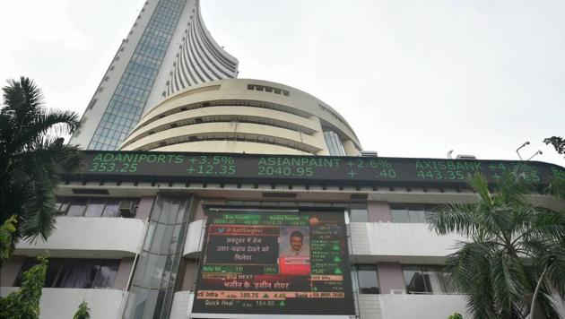 A screen on the facade of BSE building displays stock prices in Mumbai (PTI Photo/Mitesh Bhuvad) A screen on the facade of BSE building displays stock prices in Mumbai (PTI Photo/Mitesh Bhuvad)