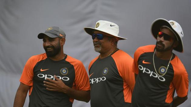 Indian cricketer Mohammed Shami (L) bowling coach Bharat Arun (C) and Mohammed Siraj looks on at nets during a training session. (AFP) Indian cricketer Mohammed Shami (L) bowling coach Bharat Arun (C) and Mohammed Siraj looks on at nets during a training session. (AFP)