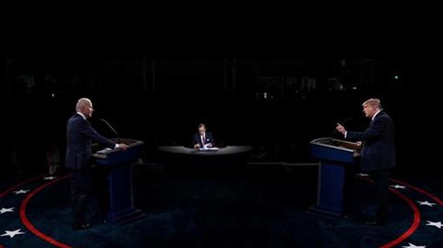 US President Donald Trump debates with Democratic candidate Joe Biden.(Reuters)