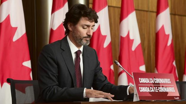 Canadian Prime Minister Justin Trudeau listens to a question as he takes part in a press conference in Ottawa on October 13.(AP)