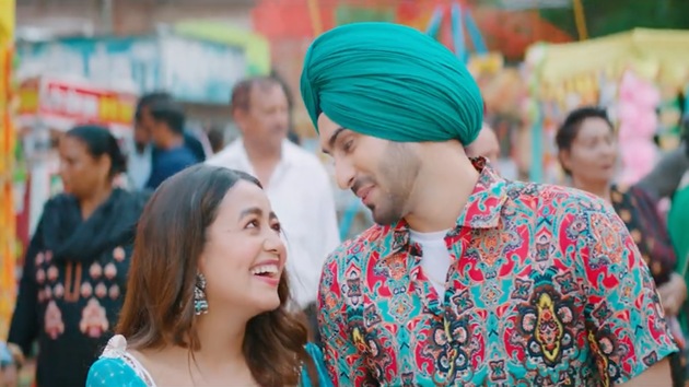 Nehu Da Vyah: A still featuring Neha Kakkar and Rohanpreet Singh. Nehu Da Vyah: A still featuring Neha Kakkar and Rohanpreet Singh.