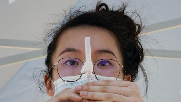 Human challenge trial will help researchers find which vaccine is the most promising one as there are several vaccines under trial now. (AP) Human challenge trial will help researchers find which vaccine is the most promising one as there are several vaccines under trial now. (AP)