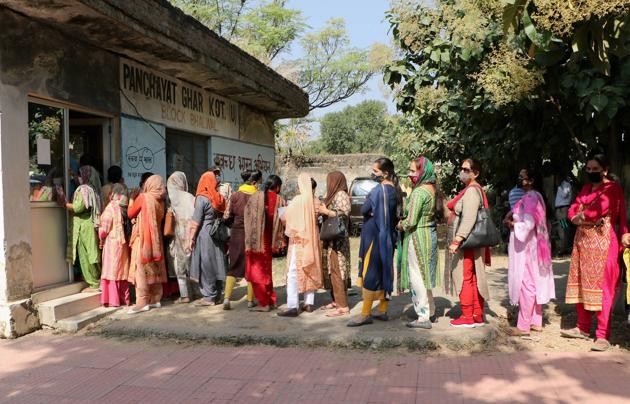 Employees of a government school queue up to register their names for COVID-19 test, on the outskirts of Jammu. (PTI) Employees of a government school queue up to register their names for COVID-19 test, on the outskirts of Jammu. (PTI)