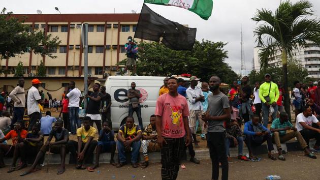 Demonstrators gathered at a street during the ongoing protests against alleged police brutality in Lagos on October 20. SARS was disbanded on October 11 but the protests have persisted with calls for law enforcement reforms. (Temilade Adelaja / REUTERS)