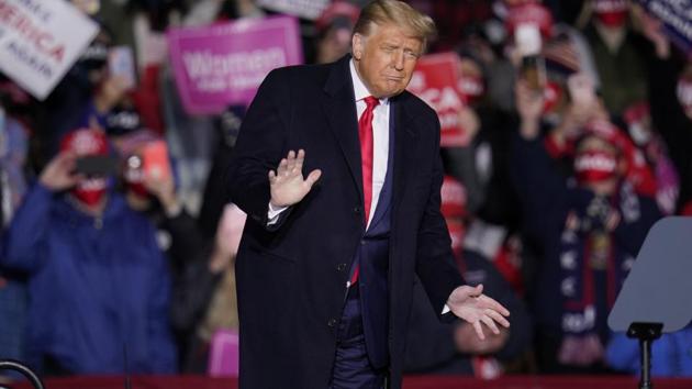 Supporters cheer as President Donald Trump departs following a campaign rally at Erie International Airport, Tom Ridge Field in Erie, Pa on Tuesday, Oct. 20, 2020. (AP Photo) Supporters cheer as President Donald Trump departs following a campaign rally at Erie International Airport, Tom Ridge Field in Erie, Pa on Tuesday, Oct. 20, 2020. (AP Photo)