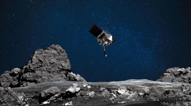 This NASA file image obtained August 11, 2020 shows an artist's rendering of the OSIRIS-REx spacecraft descending towards asteroid Bennu to collect a sample of the asteroid’s surface. (AFP File Photo) This NASA file image obtained August 11, 2020 shows an artist's rendering of the OSIRIS-REx spacecraft descending towards asteroid Bennu to collect a sample of the asteroid’s surface. (AFP File Photo)