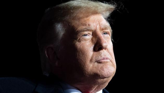 US President Donald Trump addresses supporters during a Make America Great Again rally as he campaigns at Erie International Airport in Erie, Pennsylvania, on October 20. (AFP) US President Donald Trump addresses supporters during a Make America Great Again rally as he campaigns at Erie International Airport in Erie, Pennsylvania, on October 20. (AFP)