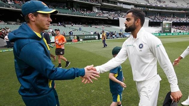 Australia captain Tim Paine (L) shakes hands with India skipper Virat Kohli(Getty Images)