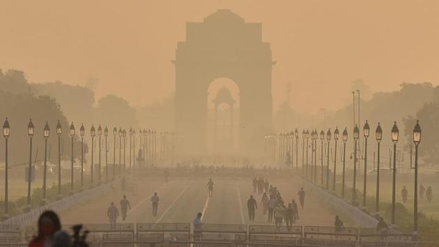 People out at Rajpath in New Delhi on October 20. The total number of confirmed Covid-19 cases stands at 340,436, while 47 new Covid-19 fatalities recorded on October 21 pushed the death toll from the viral disease to 6,128 in Delhi. (Sanjeev Verma / HT Photo)