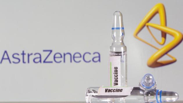 A test tube labelled with the vaccine is seen in front of AstraZeneca logo in this illustration. (Reuters Photo) A test tube labelled with the vaccine is seen in front of AstraZeneca logo in this illustration. (Reuters Photo)