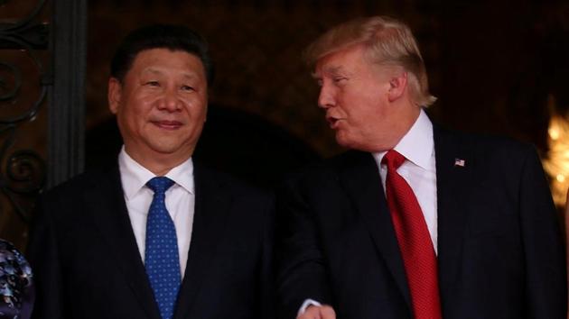 US President Donald Trump with Chinese President Xi Jinping as Xi at their summit at Trump’s Mar-a-Lago estate in West Palm Beach, Florida, US on April 6, 2017. (Reuters File Photo) US President Donald Trump with Chinese President Xi Jinping as Xi at their summit at Trump’s Mar-a-Lago estate in West Palm Beach, Florida, US on April 6, 2017. (Reuters File Photo)
