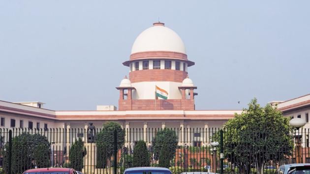 The apex court was hearing a prayer seeking clarification whether its 2018 judgment, would also cover land parcels purchased prior to notification of Section 4 of the Land Acquisition Act but transferred by landholders between August 27, 2004 and January 29, 2010 by way of collaboration agreements in favour of other parties. (HT FILE) The apex court was hearing a prayer seeking clarification whether its 2018 judgment, would also cover land parcels purchased prior to notification of Section 4 of the Land Acquisition Act but transferred by landholders between August 27, 2004 and January 29, 2010 by way of collaboration agreements in favour of other parties. (HT FILE)