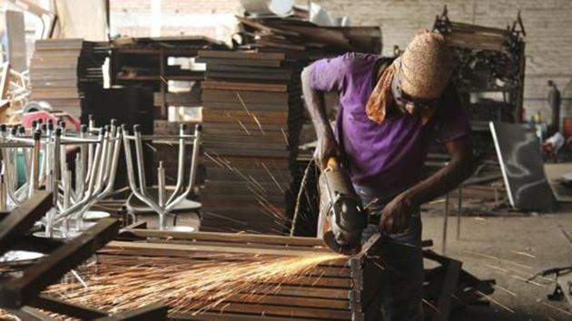 A worker prepares steel furniture at a factory on the outskirts of Jammu. (AP File Photo) A worker prepares steel furniture at a factory on the outskirts of Jammu. (AP File Photo)