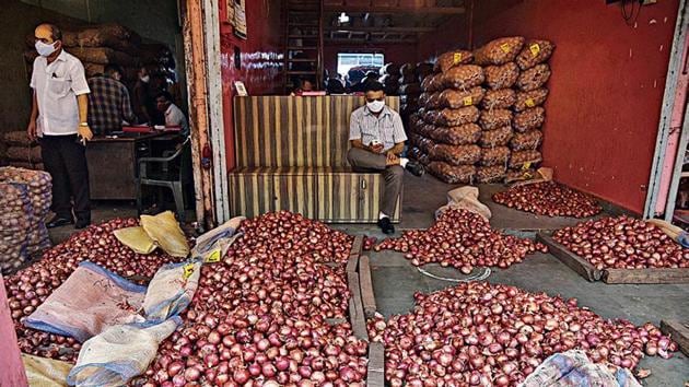 Traders at the APMC Onion Potato Market in Navi Mumbai on Friday.