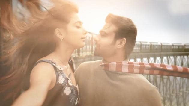 Prabhas and Pooja Hegde in a still from the new video.