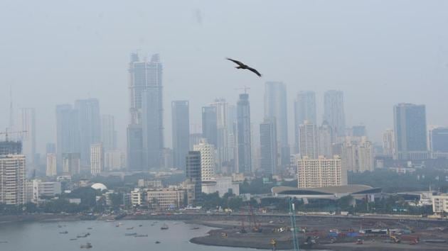A view of Mumbai’s skyline from Mahalaxmi on a hazy day on October 22. According to BMC, the city’s doubling rate — the number of days it takes to double the number of new cases of Covid-19 — was as low as three days on March 11. In contrast, the doubling rate has improved to 108 days as of October 22. (Bhushan Koyande / HT Photo) A view of Mumbai’s skyline from Mahalaxmi on a hazy day on October 22. According to BMC, the city’s doubling rate — the number of days it takes to double the number of new cases of Covid-19 — was as low as three days on March 11. In contrast, the doubling rate has improved to 108 days as of October 22. (Bhushan Koyande / HT Photo)