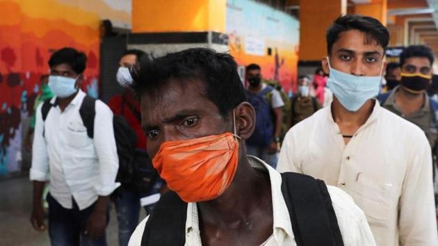 Passengers wearing protective masks stand in a queue to get tested for Covid-19), at a railway station in New Delhi earlier this month. (File photo) Passengers wearing protective masks stand in a queue to get tested for Covid-19), at a railway station in New Delhi earlier this month. (File photo)