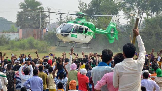 Rashtriya Janata Dal leader Tejashwi Yadav leaves via chopper after addressing an election campaign rally, ahead of Bihar Assembly Polls, in Kaimur district on October 22.(PTI)