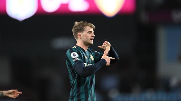 Leeds United's Patrick Bamford gestures as he celebrates his second goal during the English Premier League soccer match between Aston Villa and Leeds United at Villa Park in Birmingham, England,(AP)