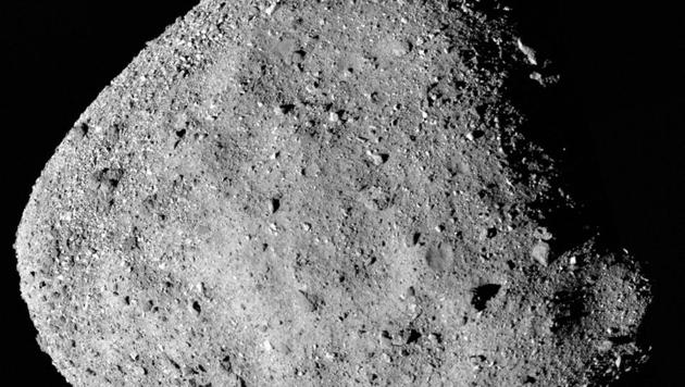 This mosaic image of asteroid Bennu, composed of 12 PolyCam images collected on December 2, 2018 by the OSIRIS-REx spacecraft from a range of 15 miles (24 km).(Reuters Photo)