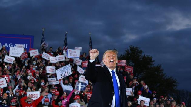 US President Donald Trump gestures during a campaign rally at Pickaway Agriculture and Event Center in Circleville, Ohio.(AFP)