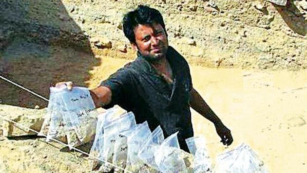 Lead researcher Kalyan Sekhar Chakraborty at the excavation site of the Indus Valley Civilisation settlement in Gujarat.(HT)