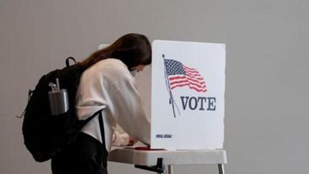 The report added that younger voters (aged 18-29) are also casting significantly more ballots and make up a greater share of the pre-Election Day vote than they did around the same time four years ago in all of the key states with information available (FILE PHOTO: REUTERS) The report added that younger voters (aged 18-29) are also casting significantly more ballots and make up a greater share of the pre-Election Day vote than they did around the same time four years ago in all of the key states with information available (FILE PHOTO: REUTERS)