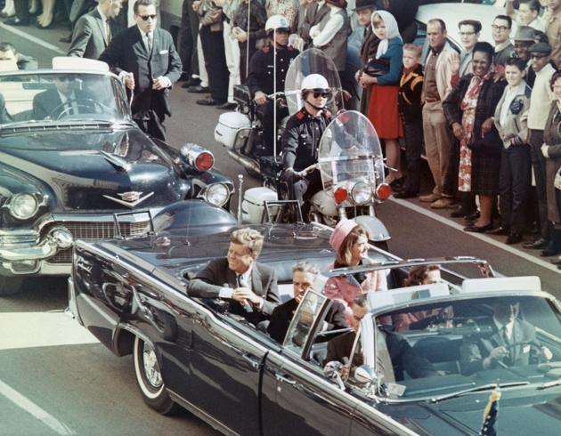 President and Mrs John F Kennedy smile at the crowds lining their motorcade route in Dallas, Texas, on November 22, 1963. Minutes later the President was assassinated as his car passed through Dealey Plaza.(Bettmann Archive) President and Mrs John F Kennedy smile at the crowds lining their motorcade route in Dallas, Texas, on November 22, 1963. Minutes later the President was assassinated as his car passed through Dealey Plaza.(Bettmann Archive)