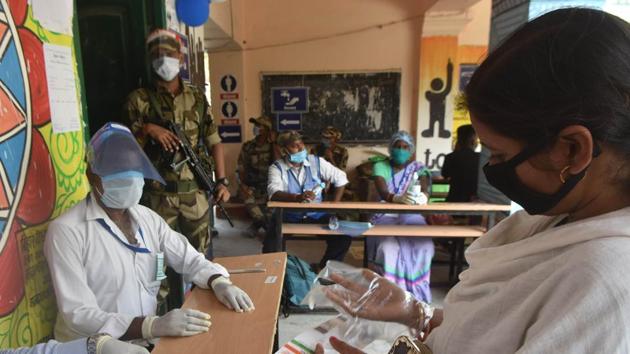 A voter presents identification documents during voting for Bihar Legislative Council elections at a polling centre at Miller High School in Patna, Bihar, India. (Photo by Parwaz Khan / Hindustan Times) A voter presents identification documents during voting for Bihar Legislative Council elections at a polling centre at Miller High School in Patna, Bihar, India. (Photo by Parwaz Khan / Hindustan Times)