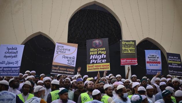 Supporters of Islami Andolan Bangladesh, an Islamist political party, protest against French President Emmanuel Macron and against the publishing of caricatures of the Prophet Muhammad they deem blasphemous, in Dhaka.(AP Photo) Supporters of Islami Andolan Bangladesh, an Islamist political party, protest against French President Emmanuel Macron and against the publishing of caricatures of the Prophet Muhammad they deem blasphemous, in Dhaka.(AP Photo)