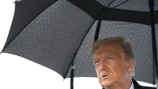 US President Donald Trump speaks to the media on arrival, Monday, Oct. 26, 2020, in Allentown, Pennsylvania (AP Photo/Alex Brandon) US President Donald Trump speaks to the media on arrival, Monday, Oct. 26, 2020, in Allentown, Pennsylvania (AP Photo/Alex Brandon)