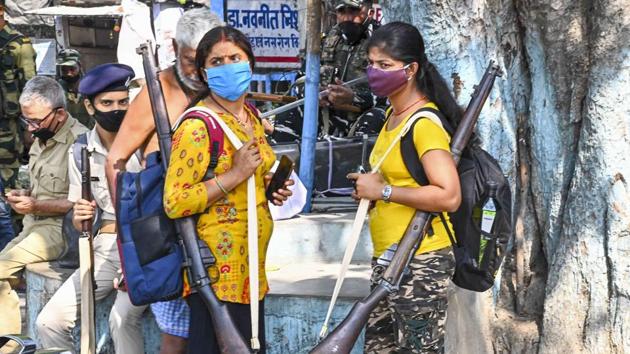 Security personnel on their way to a polling booth on the eve of first phase of Bihar Assembly Elections in Gaya district.(PTI)