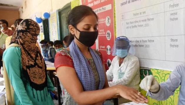Voters queued to cast their votes for Bihar Legislative Council elections in Patna, Bihar. (Santosh Kumar/HT Fille Photo) Voters queued to cast their votes for Bihar Legislative Council elections in Patna, Bihar. (Santosh Kumar/HT Fille Photo)