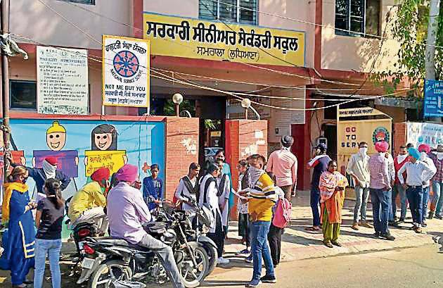 School principal Davinder Singh said the teacher was also a class in-charge so he had lots of paperwork to do. He had come in contact with some students who had come to him for registration and document-related tasks.(HT PHOTO) School principal Davinder Singh said the teacher was also a class in-charge so he had lots of paperwork to do. He had come in contact with some students who had come to him for registration and document-related tasks.(HT PHOTO)