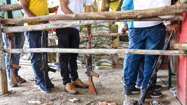 Security personnel stand in a queue to receive their weapons for election duty ahead of the first phase of Bihar assembly polls.(PTI) Security personnel stand in a queue to receive their weapons for election duty ahead of the first phase of Bihar assembly polls.(PTI)