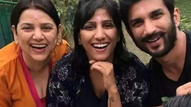 Sushant Singh Rajput poses with his sisters.