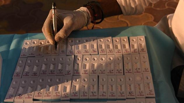 A health worker numbers test slides during sample collection for coronavirus testing at Kilkari Rainbow Home for Girls in Kashmere Gate, New Delhi on October 25. The positivity rate–the proportion of samples that returned positive among those tested–also tipped over 9% on October 28. (Vipin Kumar / HT Photo) A health worker numbers test slides during sample collection for coronavirus testing at Kilkari Rainbow Home for Girls in Kashmere Gate, New Delhi on October 25. The positivity rate–the proportion of samples that returned positive among those tested–also tipped over 9% on October 28. (Vipin Kumar / HT Photo)