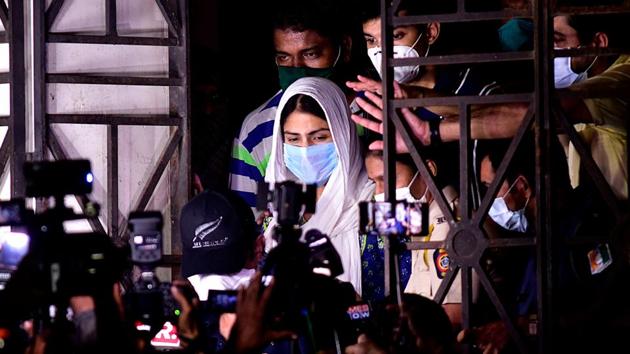Bollywood actress Rhea Chakraborty (C) leaves the Enforcement Directorate (ED) office after being questioned in relation with the investigation of the suicide case of Bollywood actor Sushant Singh Rajput, in Mumbai.(AFP) Bollywood actress Rhea Chakraborty (C) leaves the Enforcement Directorate (ED) office after being questioned in relation with the investigation of the suicide case of Bollywood actor Sushant Singh Rajput, in Mumbai.(AFP)